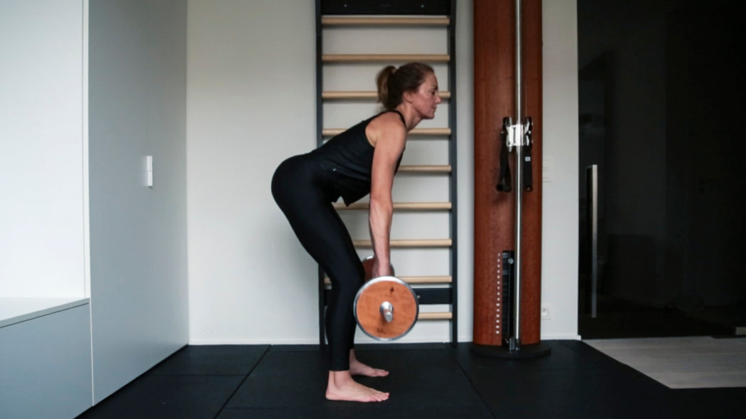 Person performing deadlift exercise for strength and healthy aging