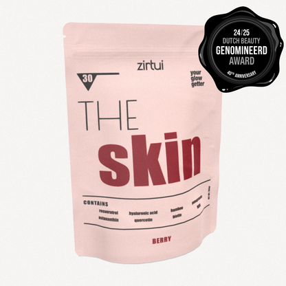 A pink pouch packaging labeled 'THE skin' by Zirtui, with a '24/25 Dutch Beauty Genomieerd Award' seal on the top right corner.